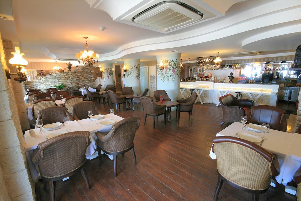Trilyali Butik Hotel Tirilye Экстерьер фото